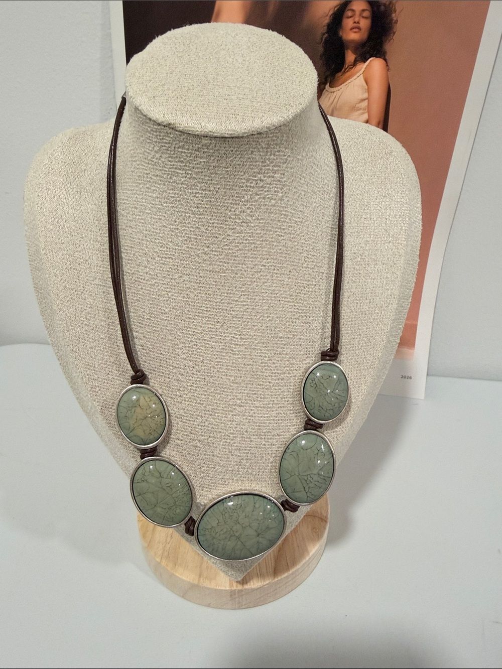 Axcess necklace green cabochon stones set in silver tone brown leather cord